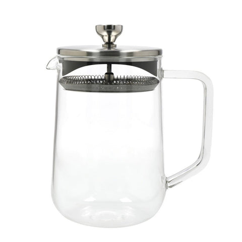 Clear glass teapot with metal infuser lid on a white background