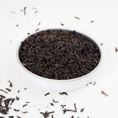 A dish of Keemun Best Loose Leaf Tea from Teaspoon Tea Co - The large rolled tea leaves look splendid and this specialty loose leaf tea tastes amazing.