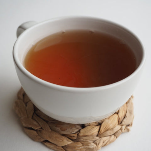A cup of Darjeeling Tea without milk, made using quality loose leaf tea from Teaspoon Tea Co
