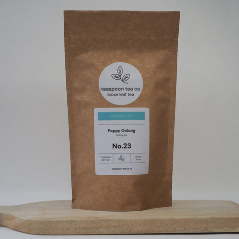 Poppy Oolong Loose Leaf Tea from Teaspoon Tea Co, is shown in a packet with a label showing the type of loose leaf tea and instructions on how to make the perfect cup of tea.