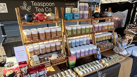 Teaspoon Tea Co. booth with tea products at an outdoor event