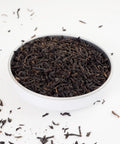A dish of Keemun Best Loose Leaf Tea from Teaspoon Tea Co - The large rolled tea leaves look splendid and this specialty loose leaf tea tastes amazing.