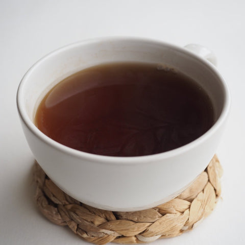 A cup Earl Grey with Blue Flowers Tea  made using Loose Leaf Tea from Teaspoon Tea Co