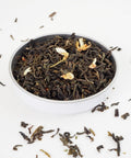 The Jasmine Flowers are dried together with green tea and this can be seen here with Jasmine with flowers Loose Leaf Tea from Teaspoon Tea Co.   Large green loose leaf tea can be seen with yellow jasmine flower heads.  A very taste Green Tea indeed.