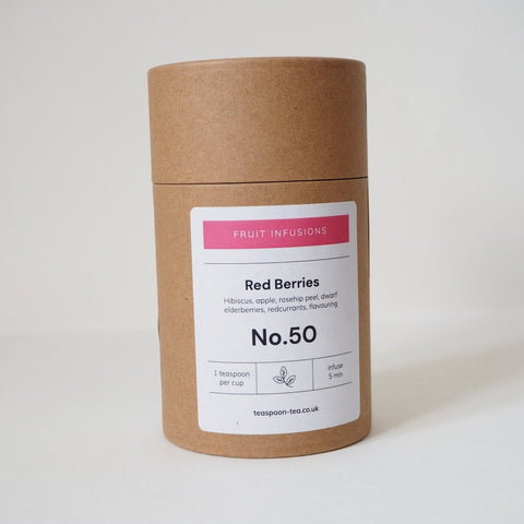 A reusable tub of Red Berries Fruit Tea from online teashop Teaspoon Tea Co.  Clearly labelled with brewing instructions for the perfect fruit tea.