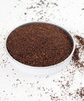 This shows a small dish of Decaffeinated Fine Tea from Teaspoon Tea Co.  The tea is fine and dusty compared to Large Leaf Tea but flavoursome and great value.  A decaff alternative to English Breakfast Tea
