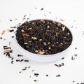Chai Tea from online teashop Teaspoon Tea Co. Chai Spice Loose Leaf Tea can be seen here with large black tea leaves, pieces of Ginger, Cloves and Ginsing.  This could be the Best Chai.  A quality Tea.