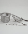 stainless steel tea infuser with the lid open