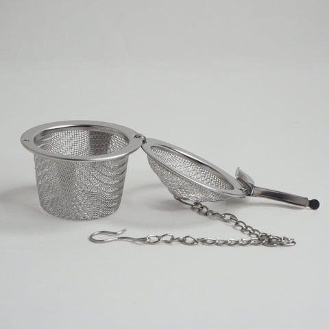 stainless steel tea infuser with the lid open