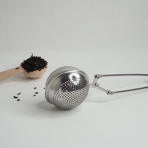 Tea ball Infuser with tea leaves