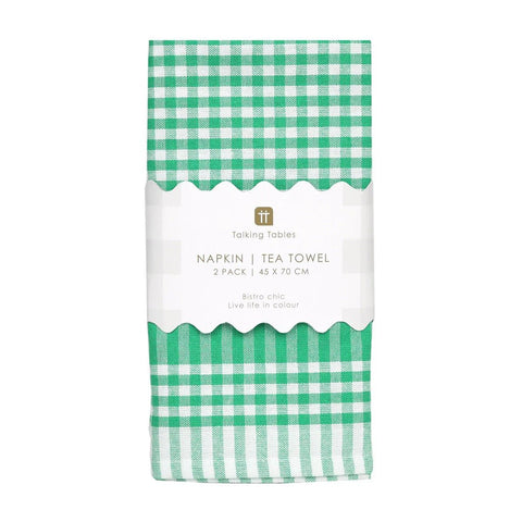 Green and white checkered tea towel packaging on a white background
