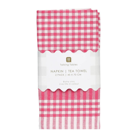 Pack of pink and white checkered tea towels with a visible brand label on a white background