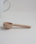 front of wooden teaspoon