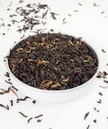 Yunnan Loose Leaf Tea from Teaspoon Tea Co.  Yunnan was the first tea growing region, this is a strong, malty tea, the photograph shows its multi-tonal large tea leaves.  This is a speciality tea from China