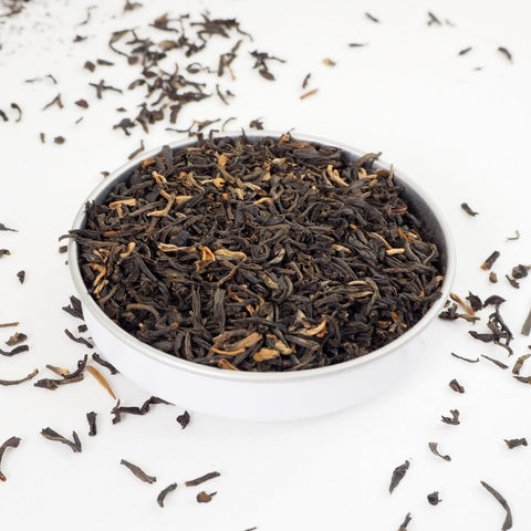 Yunnan Loose Leaf Tea from Teaspoon Tea Co.  Yunnan was the first tea growing region, this is a strong, malty tea, the photograph shows its multi-tonal large tea leaves.  This is a speciality tea from China