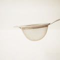 Close up of the large tea strainer