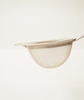Close up of the large tea strainer