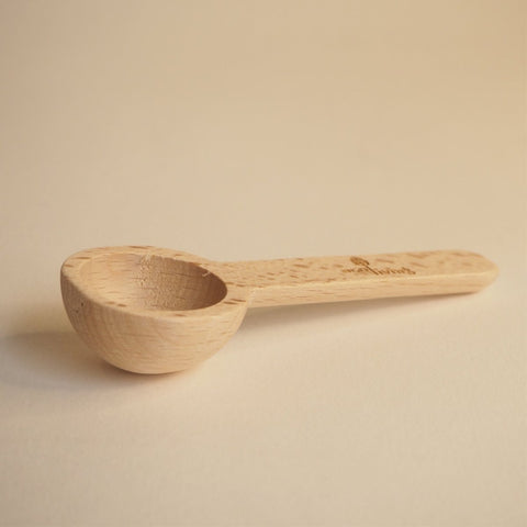 Wooden measuring spoon for tea or ground coffee, original photo by Teaspoon Tea Co